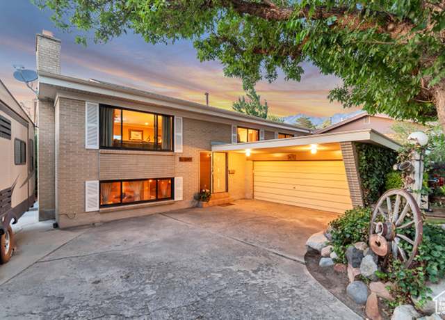 Property at 2365 E Campus Dr, Cottonwood Heights, UT 84121, 5 beds, 3 baths