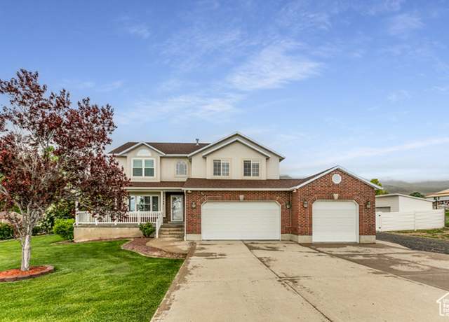 Property at 7468 N Adobe Ln, Lake Point, UT 84074, 4 beds, 3.5 baths