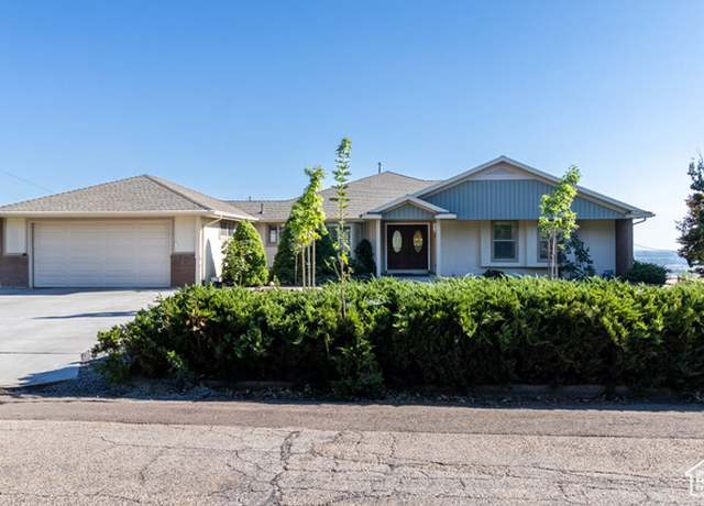 Property at 1243 W 4000 N, Pleasant View, UT 84414, 5 beds, 3 baths