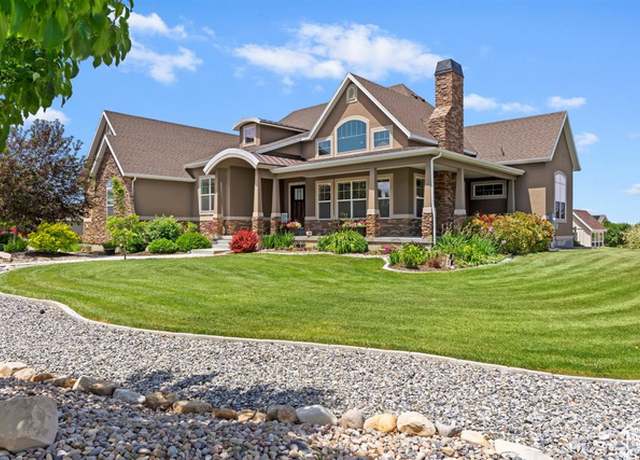 Property at 1097 E Highline Rd, Lake Point, UT 84074, 7 beds, 4 baths