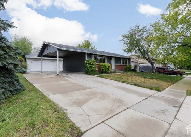 Property at 5550 Westside Dr, Kearns, UT 84118, 4 beds, 2 baths