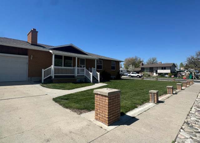 Property at 5552 S South Hew Wood Dr, Taylorsville, UT 84129, 4 beds, 3 baths