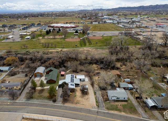 Property at 1674 E 1700 S, Naples, UT 84078, 4 beds, 3 baths