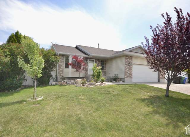 Property at 5057 W 6960 S, West Jordan, UT 84081, 4 beds, 3 baths