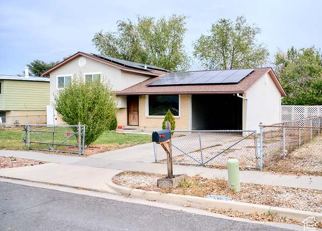 Property at 4511 S Early Duke St W, West Valley City, UT 84120, 4 beds, 2 baths
