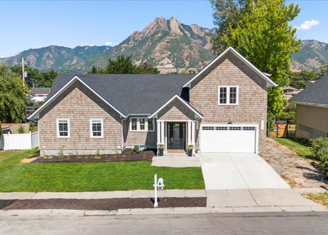 Property at 5273 S Gurene Dr E, Salt Lake City, UT 84117, 5 beds, 3.5 baths