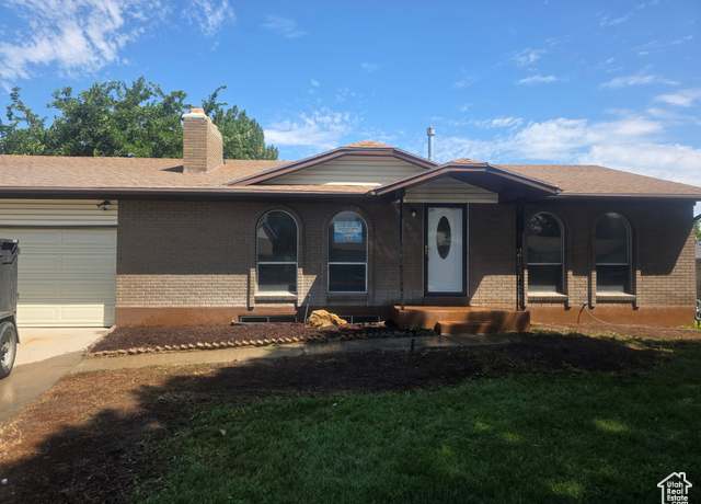 Property at 2540 W Gunlock Dr, Taylorsville, UT 84129, 4 beds, 2 baths