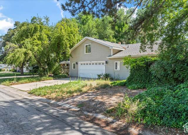Property at 5163 S Eastmoor Rd, Salt Lake City, UT 84117, 5 beds, 4 baths