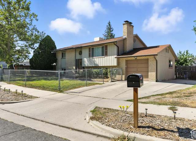 Property at 852 E Enchanted Dr, Midvale, UT 84047, 4 beds, 2 baths