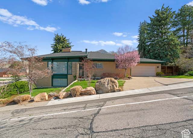 Property at 3427 E Brockbank Dr, Salt Lake City, UT 84124, 5 beds, 3 baths