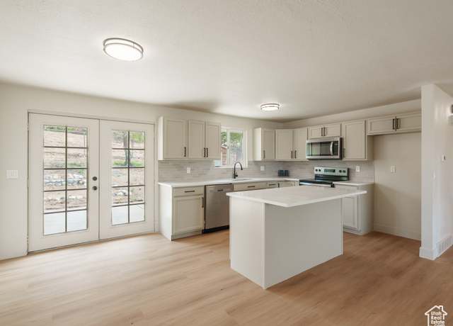 Property at 9633 S 1210 E, Sandy, UT 84094, 4 beds, 2 baths