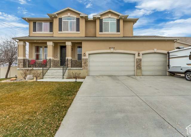 Property at 6990 S High Bluff Dr, West Jordan, UT 84081, 4 beds, 2.5 baths