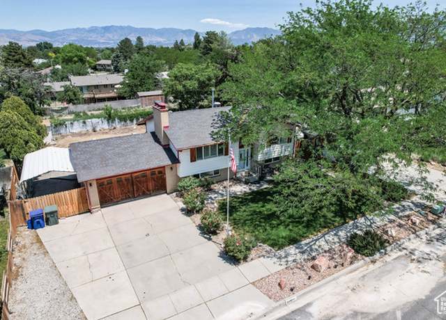 Property at 3498 W Harrisonwood Dr, West Valley City, UT 84119, 4 beds, 2 baths