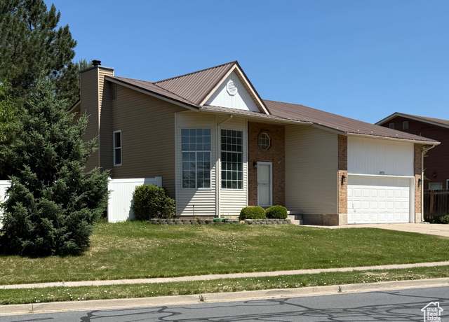 Property at 1973 E Sunset Dr, Layton, UT 84040, 5 beds, 3 baths
