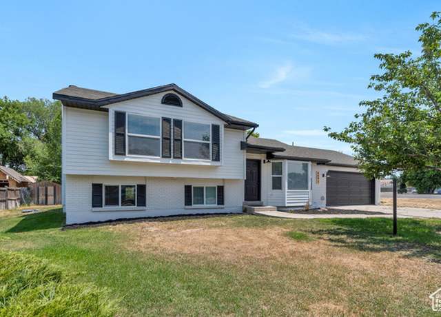 Property at 4093 S Peachwood Dr, West Valley City, UT 84119, 4 beds, 2.5 baths