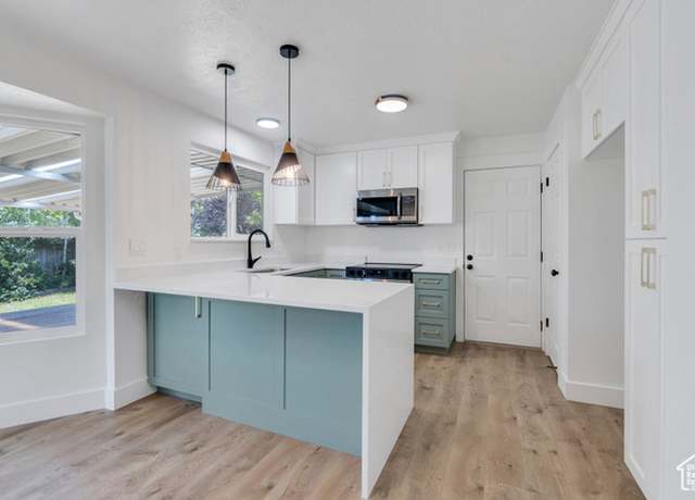 Property at 4093 S Peachwood Dr, West Valley City, UT 84119, 4 beds, 2.5 baths