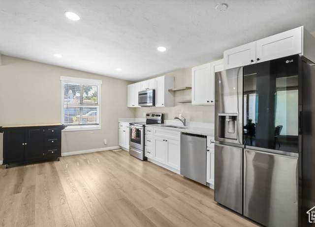 Property at 6033 S 2100 W, Roy, UT 84067, 5 beds, 2 baths