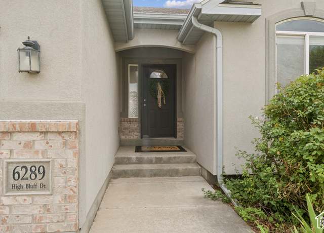 Property at 6289 S High Bluff Dr, West Valley City, UT 84118, 5 beds, 3 baths