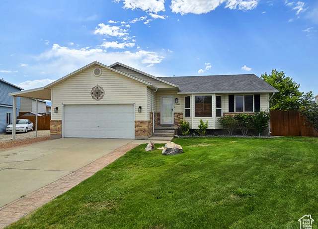Property at 5480 W Sun Ridge Ct, Kearns, UT 84118, 4 beds, 2 baths