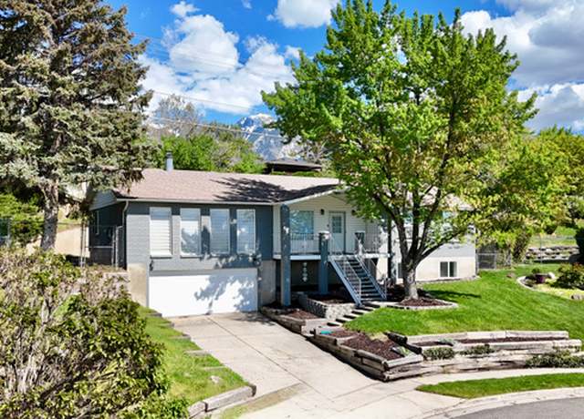 Property at 9977 S Lannae Dr E, Sandy, UT 84094, 5 beds, 4 baths