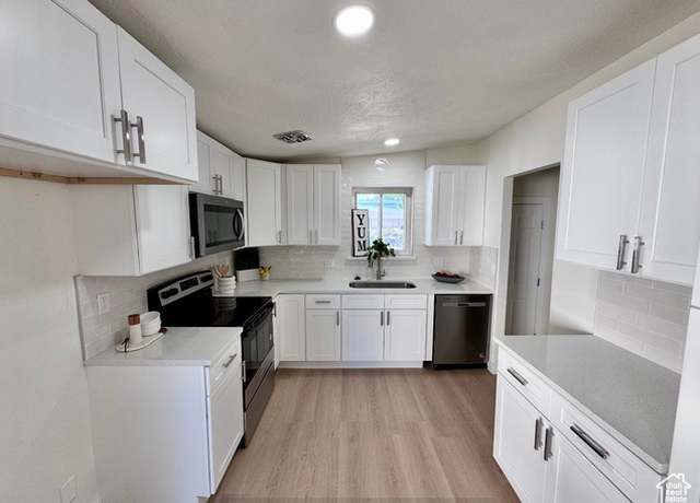 Property at 5011 S Leisure Ln W, Taylorsville, UT 84129, 6 beds, 2 baths