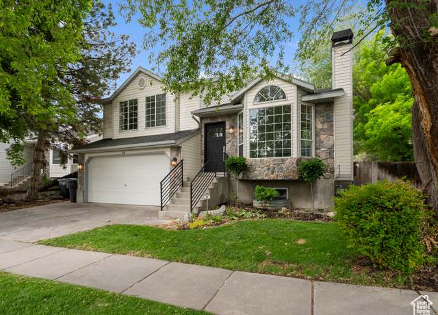 Property at 6098 S Eagle Nest Dr, Murray, UT 84123, 5 beds, 2 baths