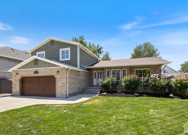 Property at 5760 S Surreyrun Rd E, Murray, UT 84107, 5 beds, 3.5 baths