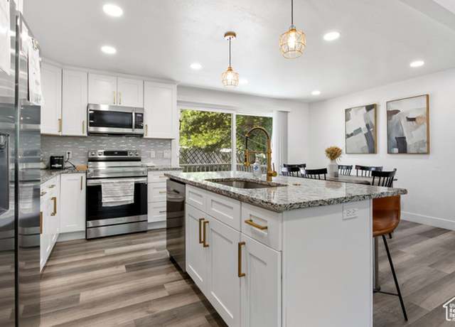 Property at 8485 S 1575 E, Sandy, UT 84093, 4 beds, 3 baths