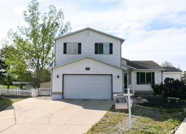 Property at 153 Country Club Dr E, Stansbury Park, UT 84074, 5 beds, 3.5 baths