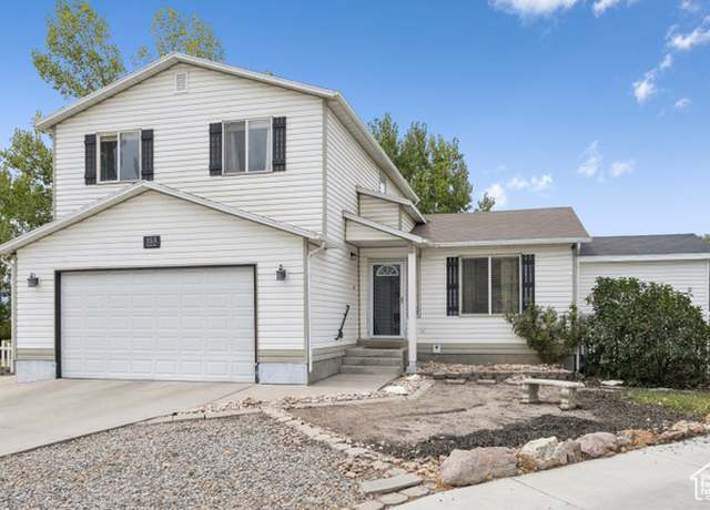 Property at 153 Country Club Dr E, Stansbury Park, UT 84074, 5 beds, 3.5 baths