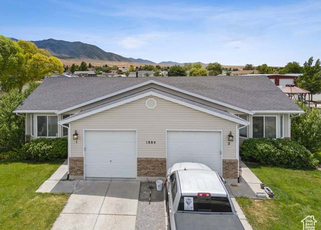 Property at 1884 E Shepard Ln, Lake Point, UT 84074, 4 beds, 3 baths