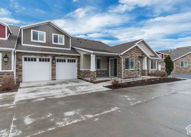 Property at 7046 W Adamo Dr, West Valley City, UT 84128, 3 beds, 3 baths