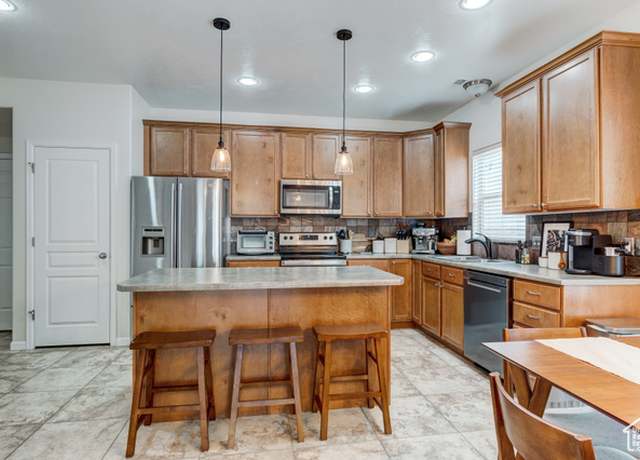 Property at 1424 W Stone Meadow Dr, West Jordan, UT 84088, 2 beds, 2.5 baths