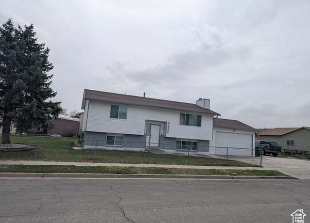 Property at 4635 W Eskesen Dr S, West Valley City, UT 84120, 4 beds, 2 baths