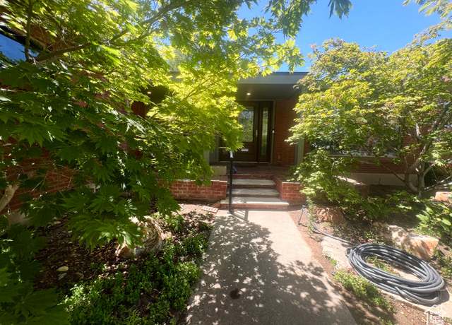 Property at 3550 E Oakview Dr, Millcreek, UT 84124, 5 beds, 3 baths