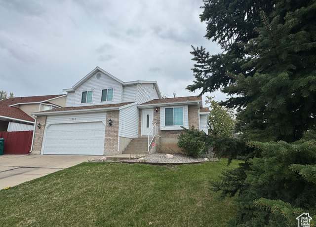 Property at 1952 E Sunset Dr, Layton, UT 84040, 4 beds, 2.5 baths