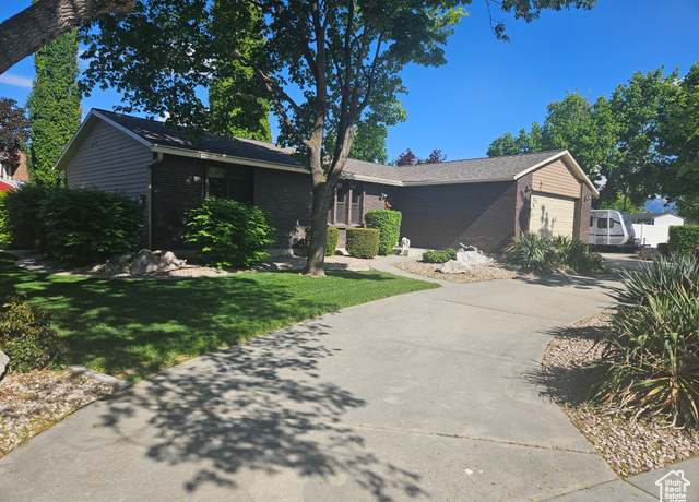 Property at 5235 S Spring Clover Dr W, Salt Lake City, UT 84123, 5 beds, 2 baths