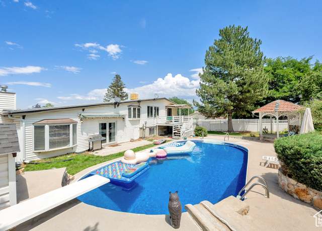 Property at 1481 W Bluemont Dr, Murray, UT 84123, 5 beds, 3 baths