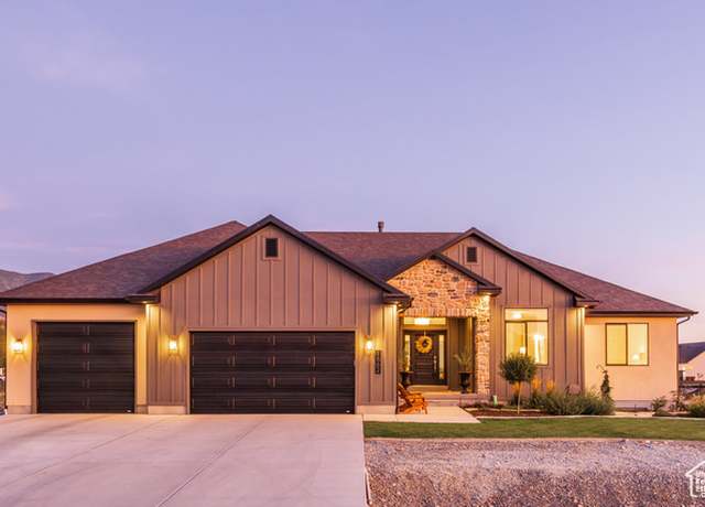 Property at 1662 E Cluff Ln N, Lake Point, UT 84074, 6 beds, 3 baths