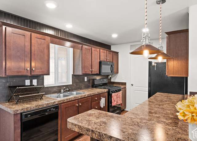 Property at 229 E Biltmore Ave, Murray, UT 84107, 3 beds, 2 baths