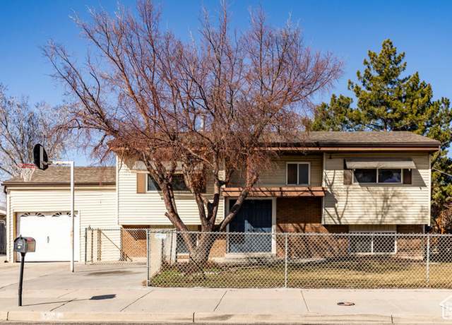 Property at 3068 S Mock Orange Dr, West Valley City, UT 84119, 4 beds, 2 baths