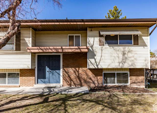 Property at 3068 S Mock Orange Dr, West Valley City, UT 84119, 4 beds, 2 baths