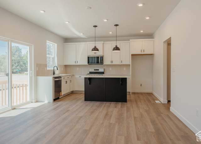 Property at 949 W Columbia Ct S #106, Riverdale, UT 84405, 4 beds, 3.5 baths