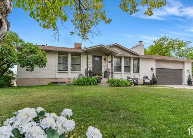 Property at 2261 W Tierra Rose Dr, Taylorsville, UT 84129, 5 beds, 3 baths