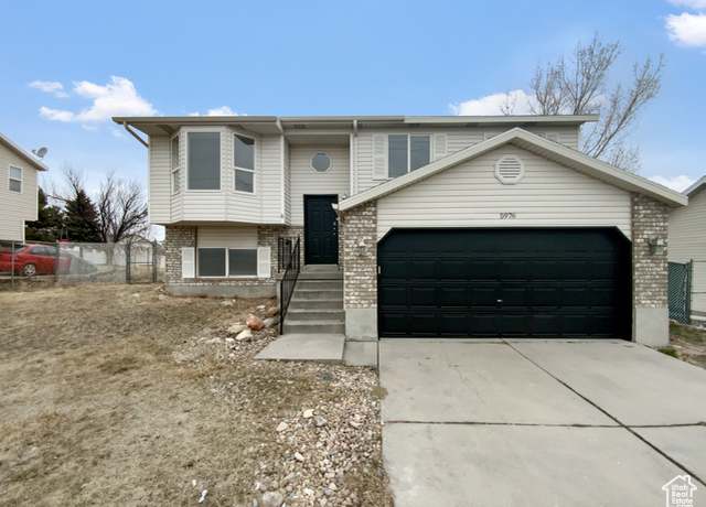 Property at 5976 W 7000 S, West Jordan, UT 84081, 4 beds, 2 baths