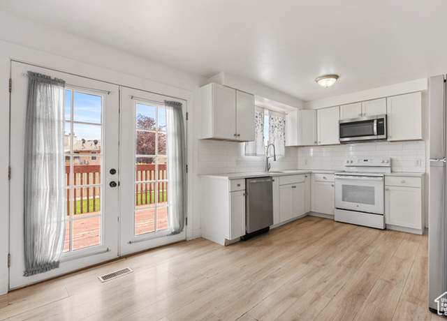Property at 4217 S Hopi Dr, West Valley City, UT 84119, 5 beds, 2 baths