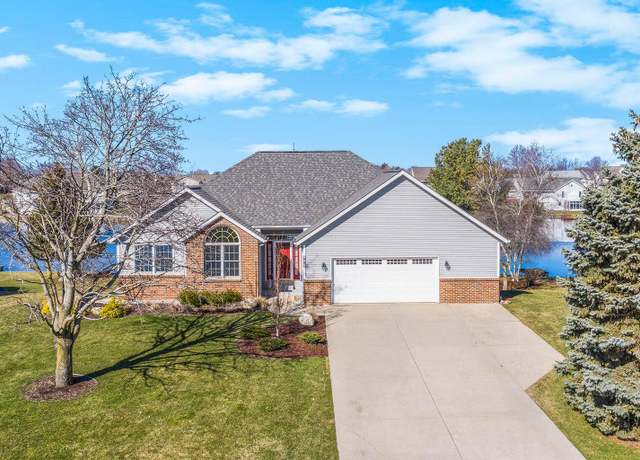 Property at 975 Bluff Lake Dr, Zeeland, MI 49464, 4 beds, 4 baths