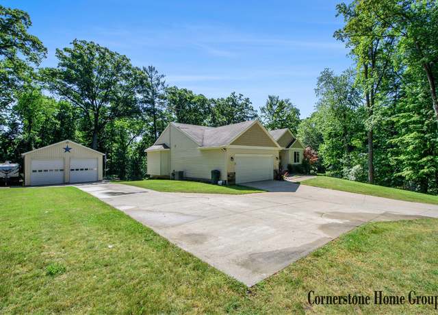 Property at 9030 Elstner Ave NE, Rockford, MI 49341, 4 beds, 3.5 baths