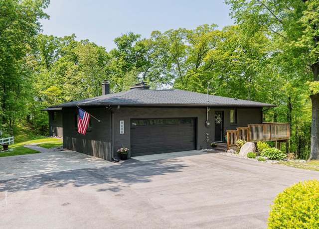 Property at 8680 Bennett St SE, Ada, MI 49301, 5 beds, 3 baths