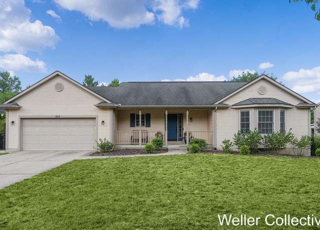 Property at 456 Countrymeadow Dr NE, Comstock Park, MI 49321, 4 beds, 2 baths